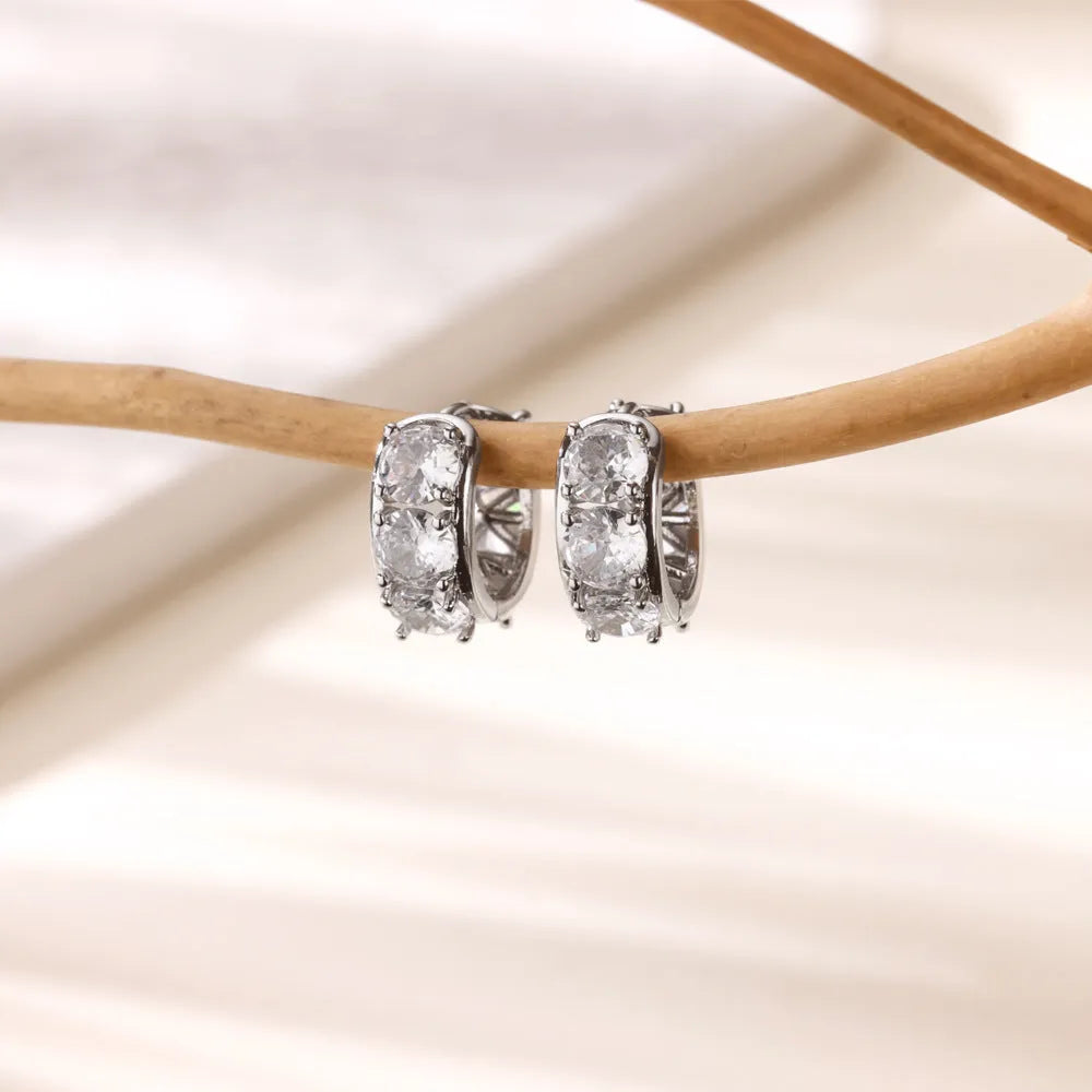 Women's U-shaped stainless steel ear clip earrings with inlaid zircon detailing in colour E5772P.