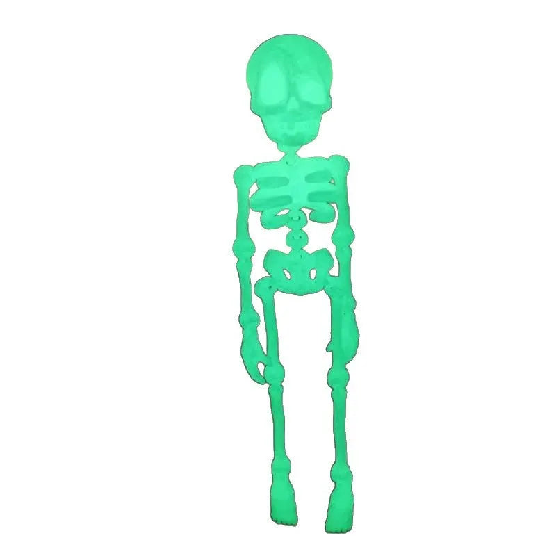 3D-printed white skull refrigerator magnet, 18cm tall, on a fridge door.
