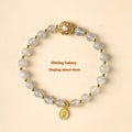 Hand-woven gray moonstone crystal bracelet with sunstone and strawberry quartz 6mm beads showing sun moon elements