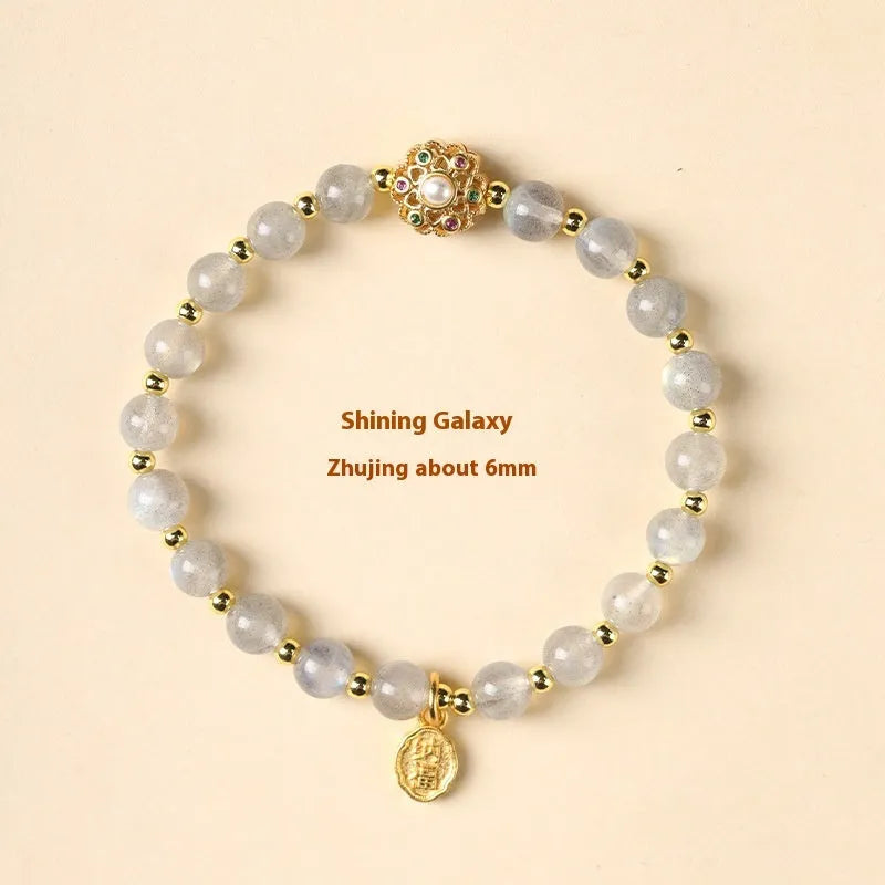 Hand-woven gray moonstone crystal bracelet with sunstone and strawberry quartz 6mm beads showing sun moon elements