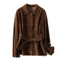 Yellow brown loose fit cashmere coat with a Peter Pan collar and a brown leather belt.