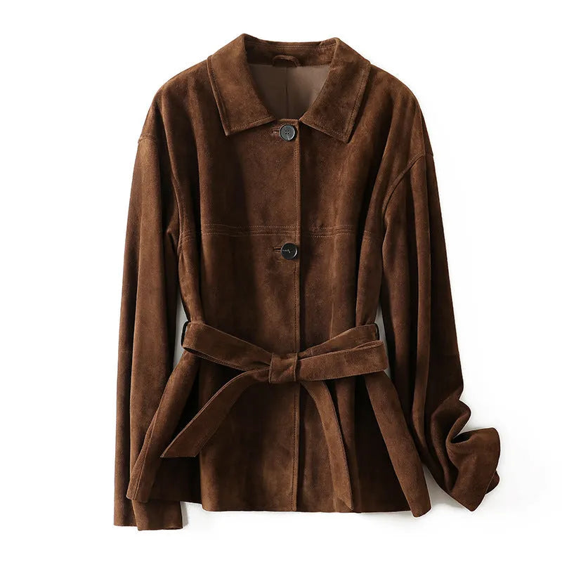Yellow brown loose fit cashmere coat with a Peter Pan collar and a brown leather belt.
