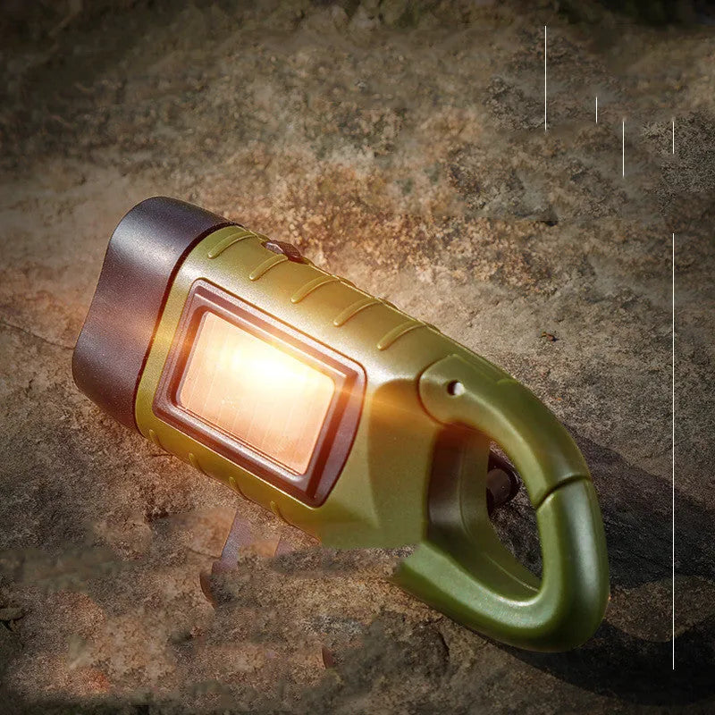 Outdoor hand-cranked solar USB charging emergency LED flashlight in olive green with 12x45x32mm dimensions
