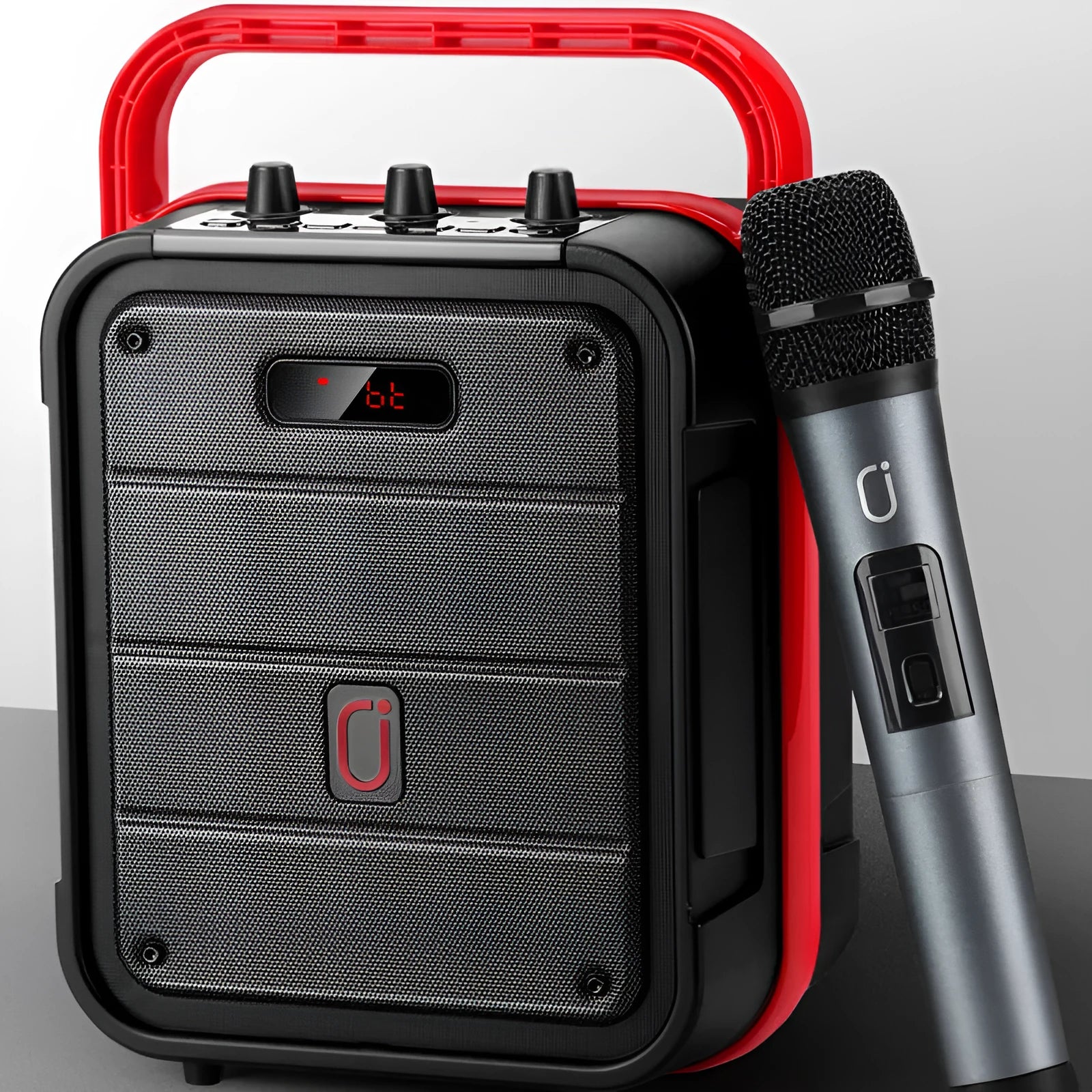 MS62AI portable Bluetooth speaker with wireless microphone on a table
