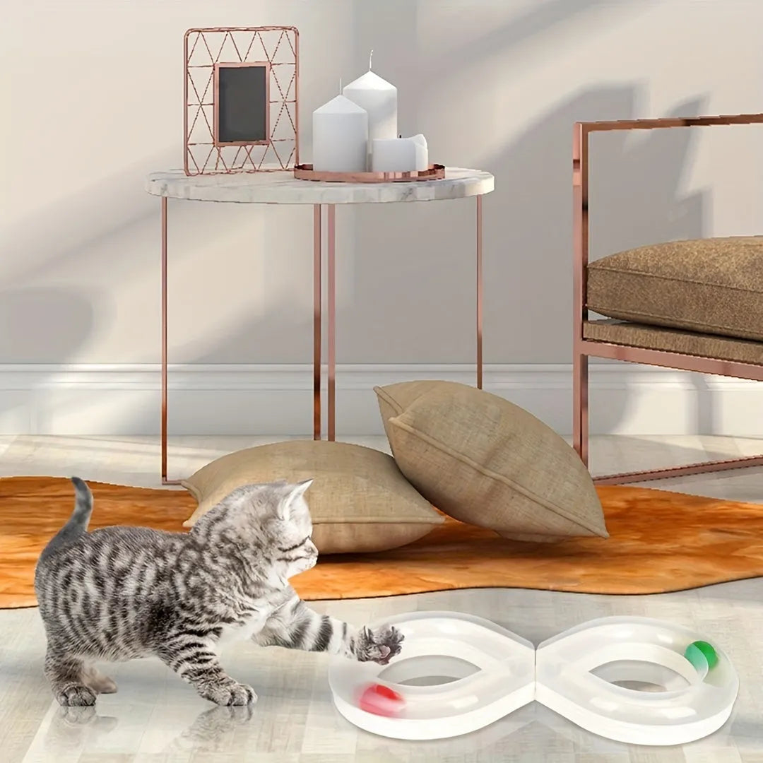 Cat toy set with turntable track ball amusement centre and teasing cat stick on blue background