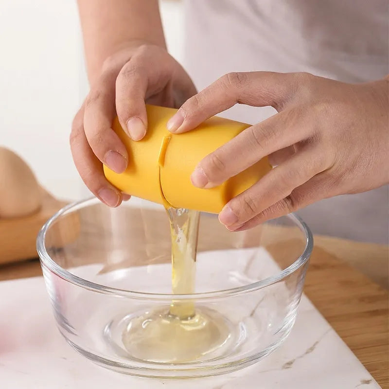 Egg shell opener kitchen tool in orange colour with stainless steel blades