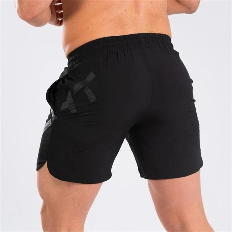 Men's knee-length quick-dry training shorts in nylon fabric for summer running and sports
