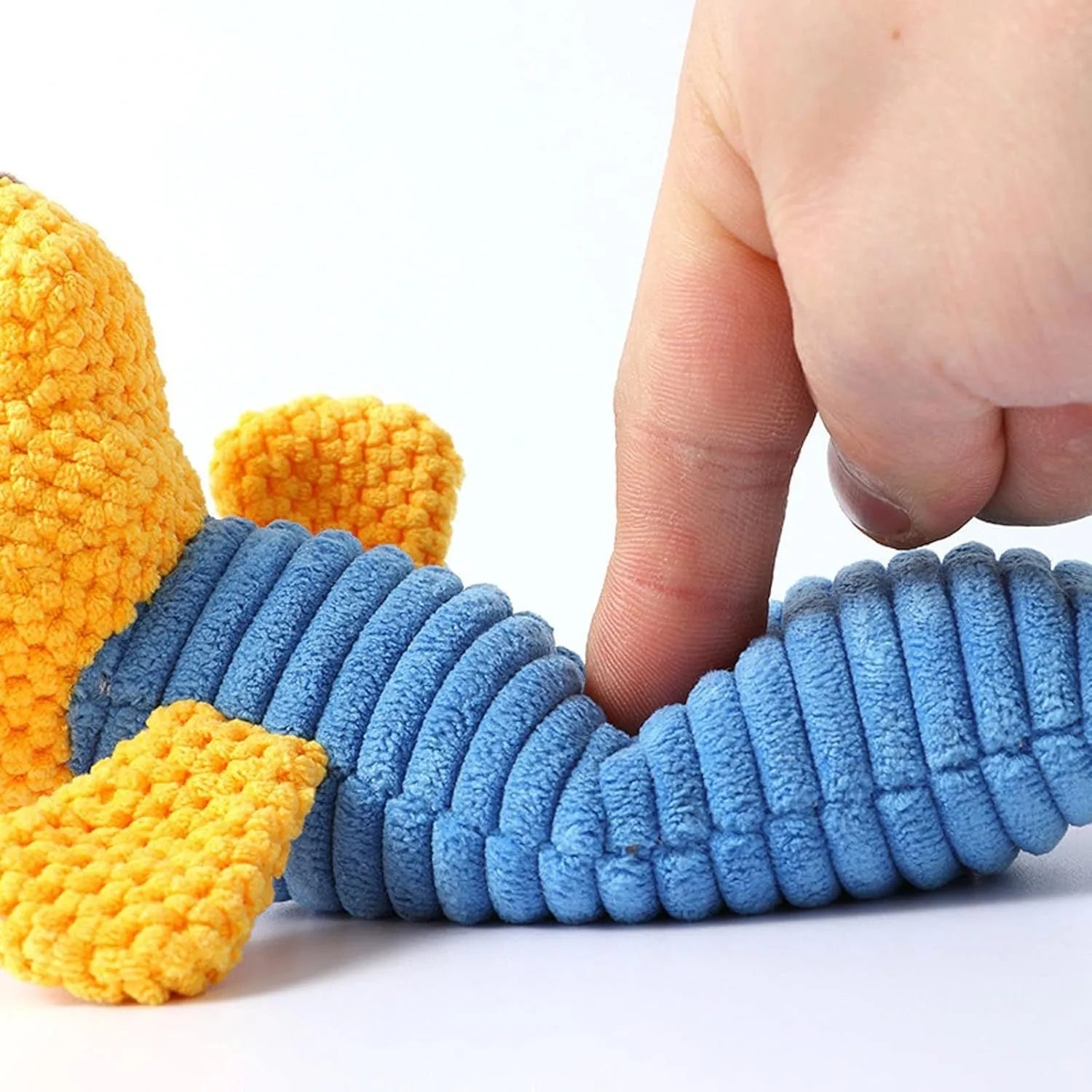 Squeaky stuffed calf, frog, or puppy dog chew toy for dental cleaning and teething relief.