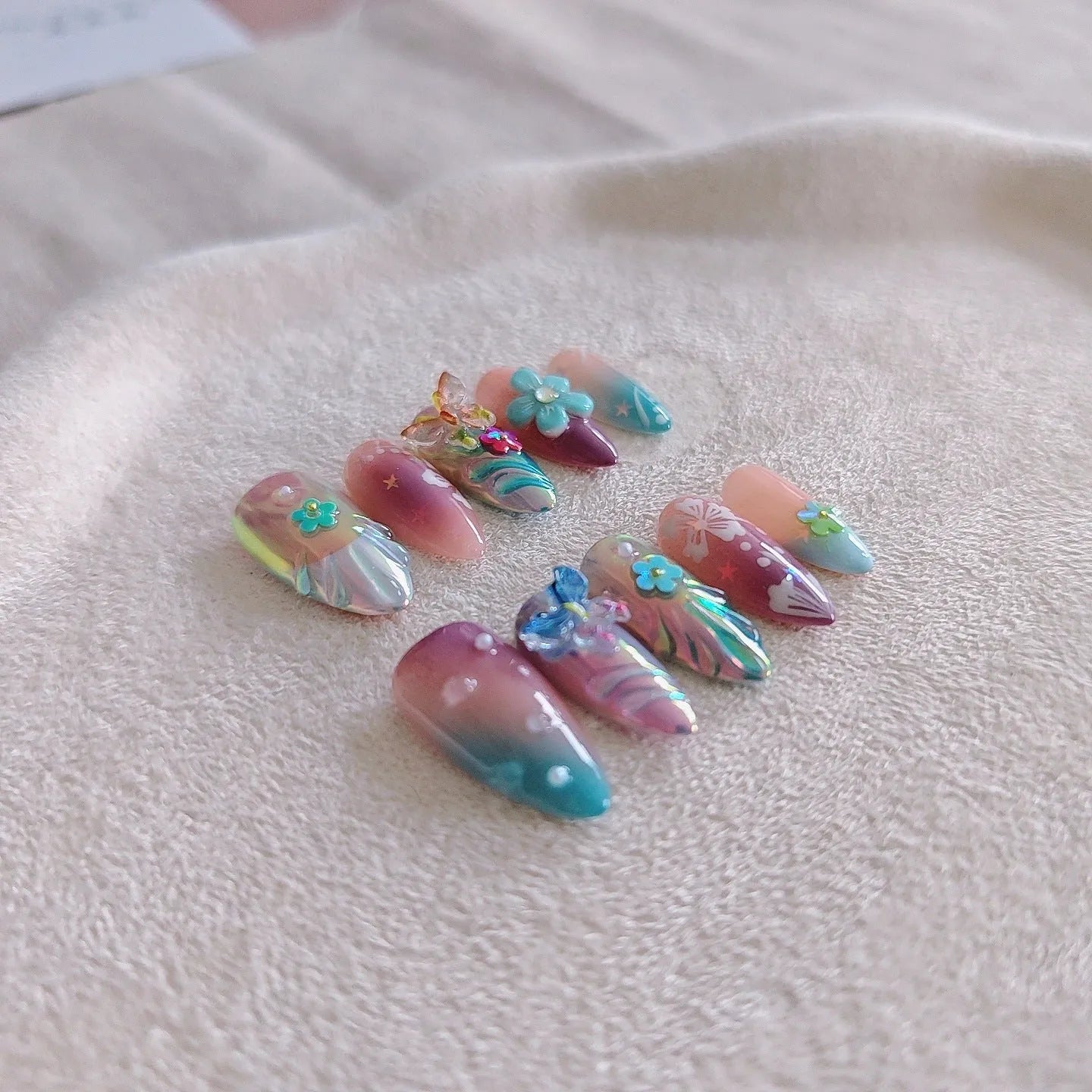 Handmade colourful embossed floral and butterfly nail art sculptures in sizes XS, S, M, L.