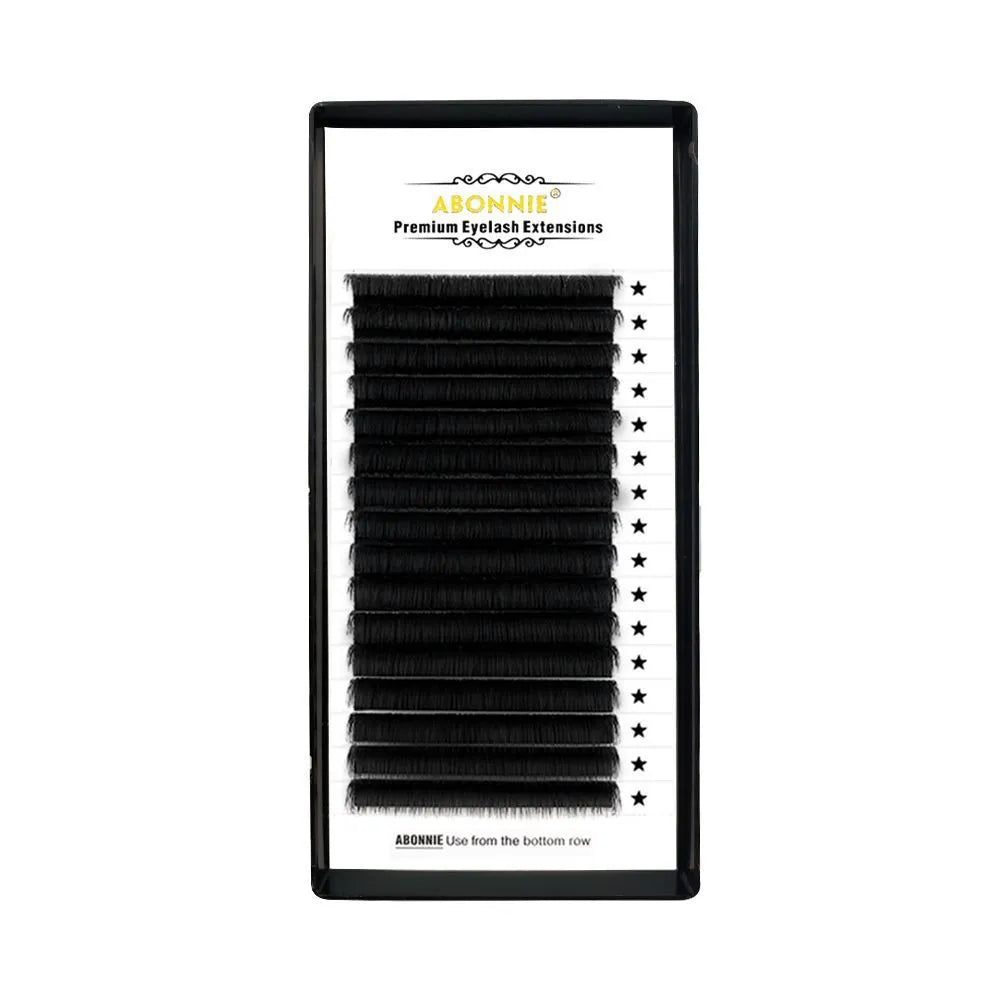 A 16-row dense tray of matte round wool false eyelashes made from mink hair, showing variations in length.