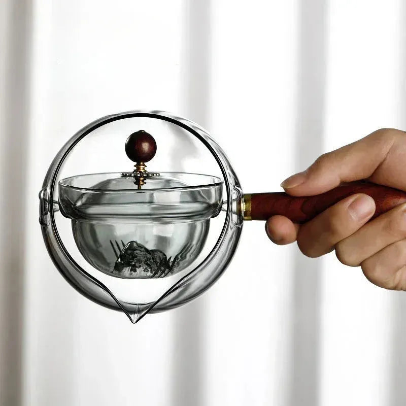 Semi-automatic rotary glass teapot with wooden handle and infuser in transparent borosilicate glass