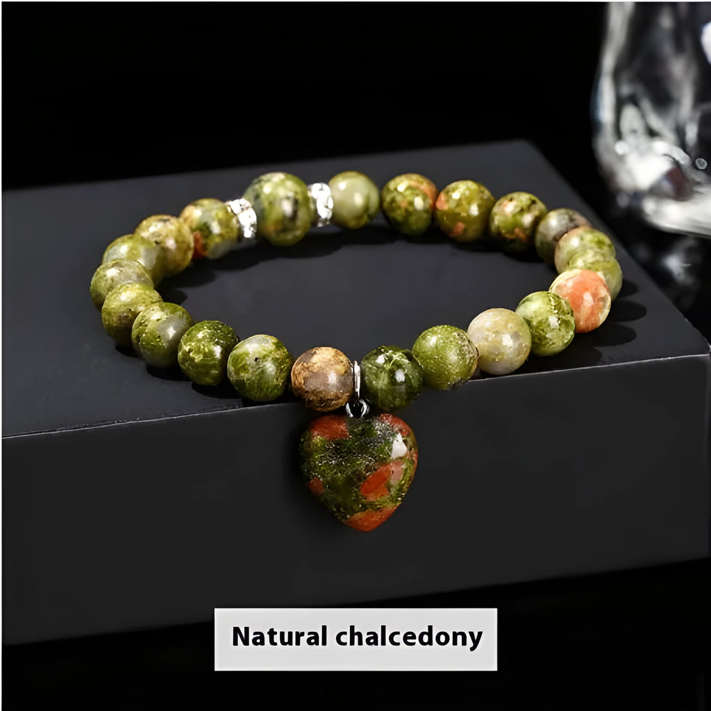Handmade natural gemstone bracelet with tiger's eye, aventurine, and crystal beads in geometric round design