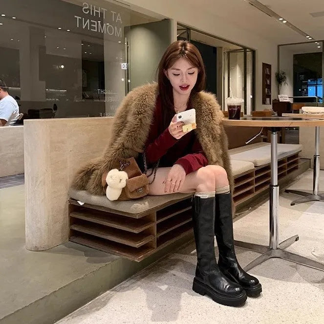 Women's black long tube knight boots with round toe and chunky rubber sole