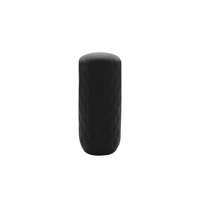 Six silicone protective cases for travel storage bottles in assorted colours on white background