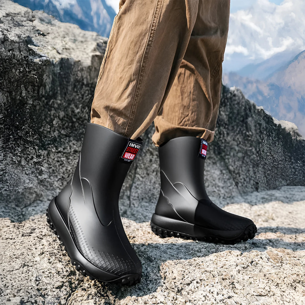 Men's PVC rain boots in black red colour with non-slip plastic soles and round toe design