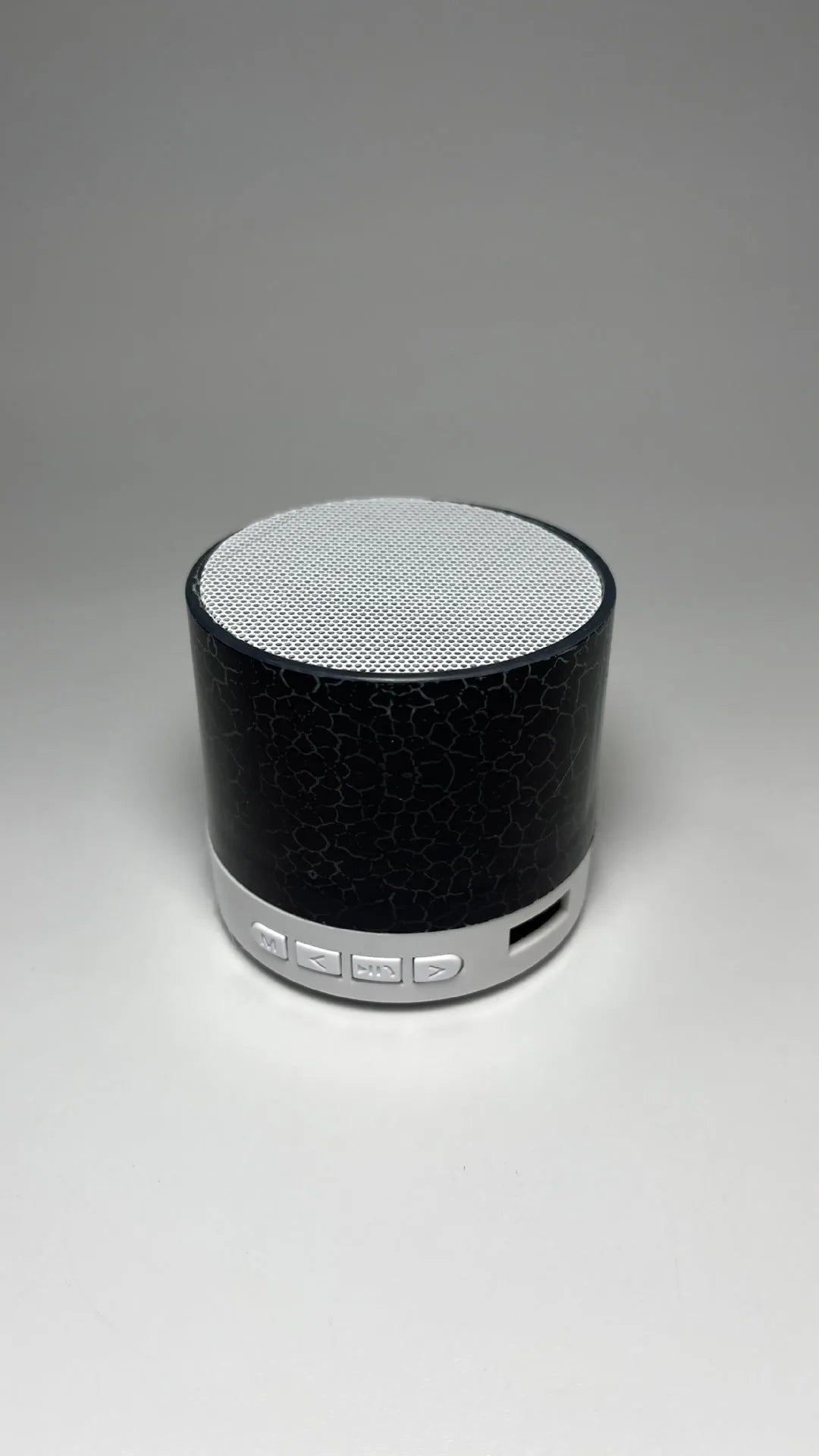 A9 Mini Cracked Bluetooth speaker in white with cracked-effect finish and LED lights