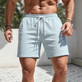 Men's straight-leg loose fit polyester track shorts in five solid colours including white, black, navy blue, light blue and khaki