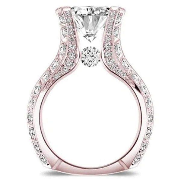 Rose gold electroplated oval shaped zircon engagement ring on alloy band