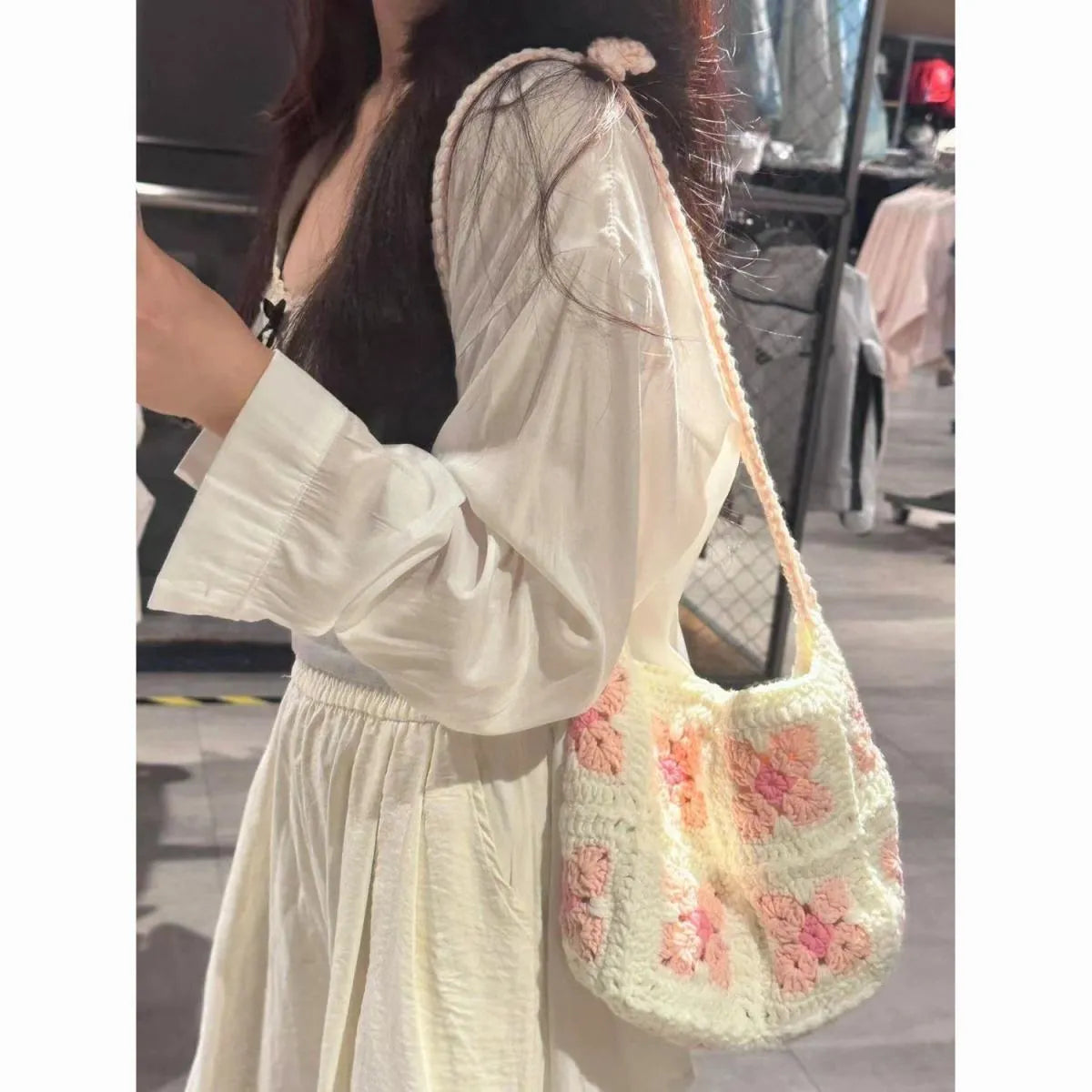 Handmade cotton crochet handbag with pink cherry blossom design and magnetic buckle