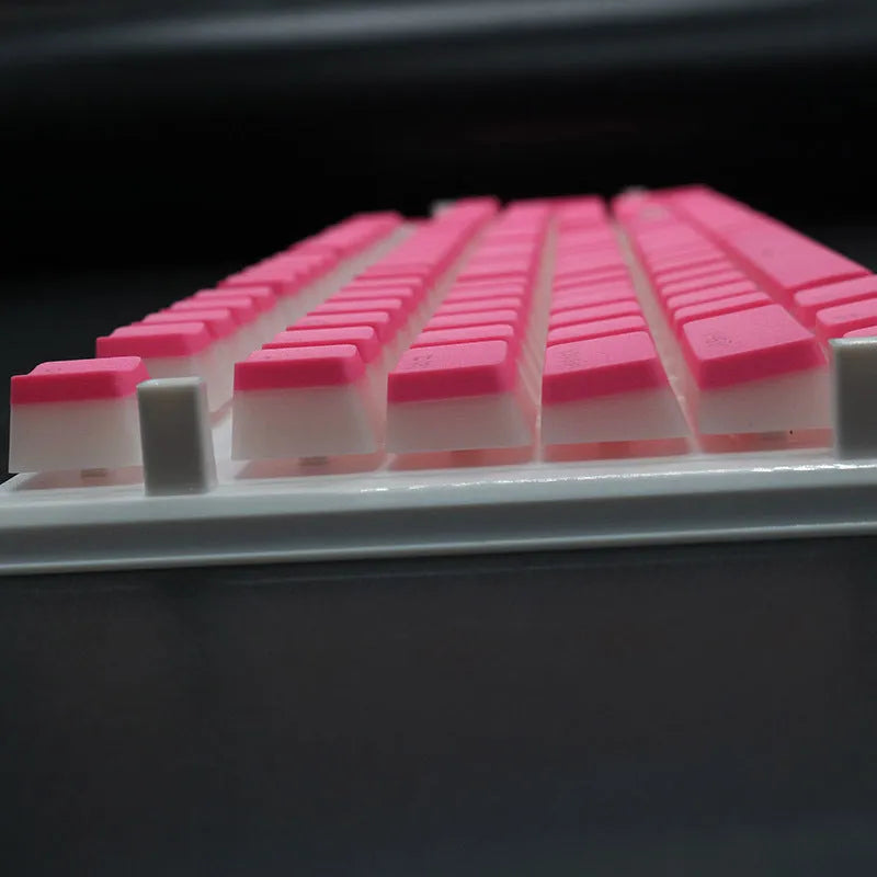 Set of 108 PBT pudding profile keycaps for mechanical keyboards in various colours on a white background.