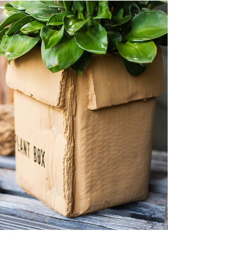 Cement brown paper box flowerpot with drainage holes for indoor planting