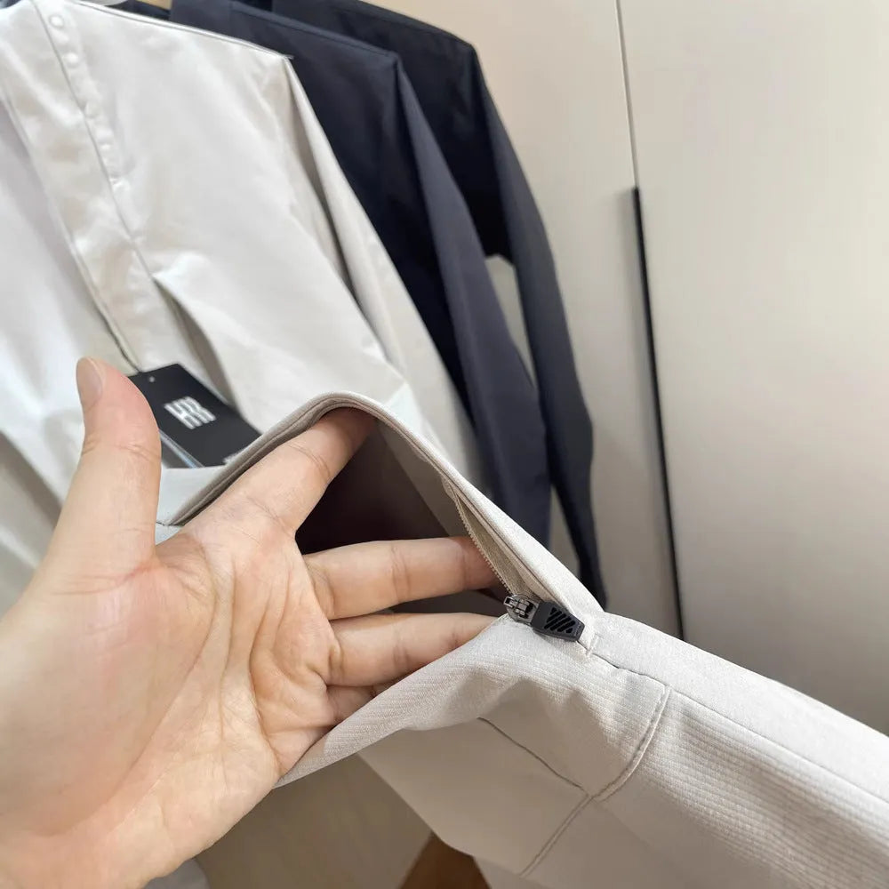 Men's stand collar casual jacket in polyester, shown in black, dark blue, and beige.