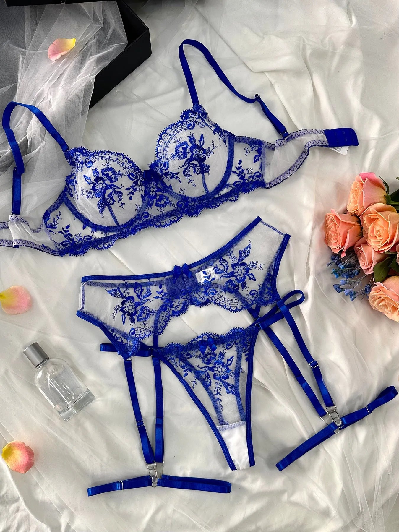 Women's embroidered see-through underwear set with cut-out design and lace-up garter straps