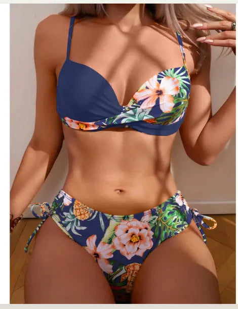 Women's green printed bikini set with push-up top and drawstring side briefs on a mannequin.