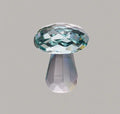 Colourful geometric mushroom crystal decorative ornament in transparent, green, red, or yellow.