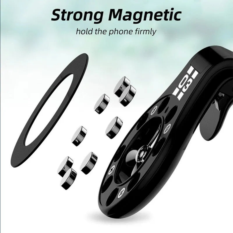 Black magnetic car phone holder mounted on vehicle air vent with smartphone attached