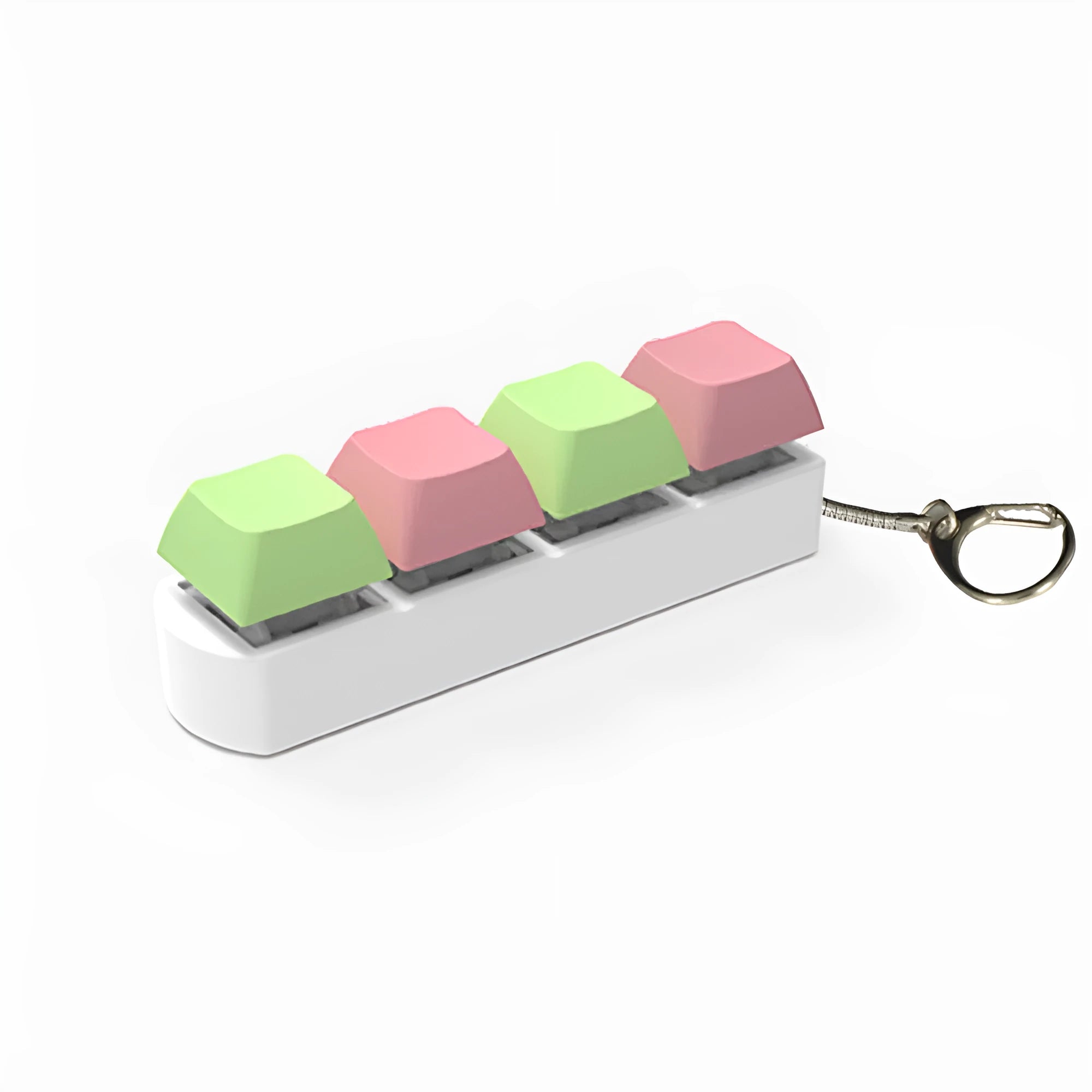 4-key mechanical keyboard switch tester in assorted colours on a desk