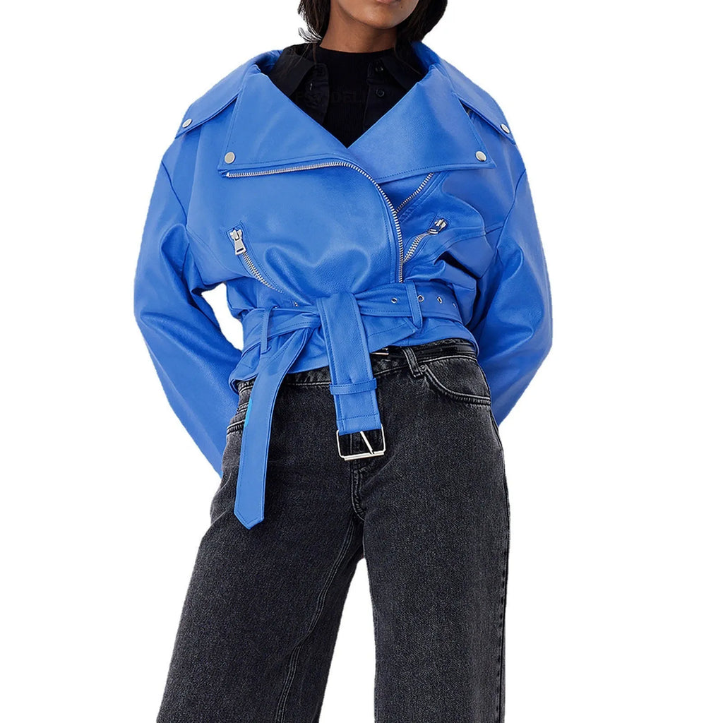 Punk short black jacket with lapel, belt, and Peter Pan collar on a model.