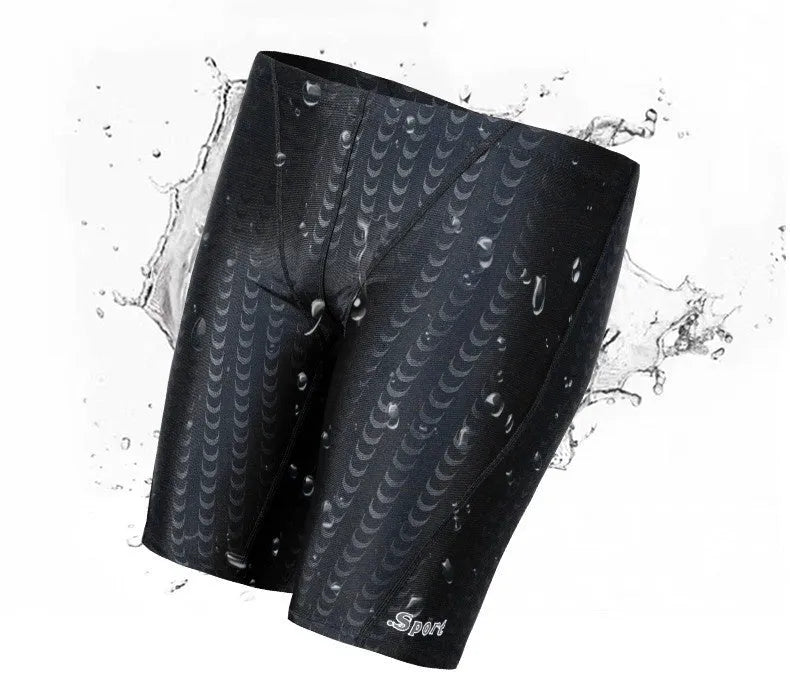 Men's solid colour swimming trunks in shark skin polyester fabric for beach surfing and swimming