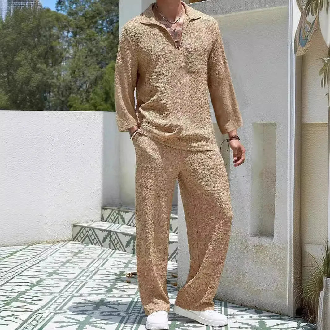 Men's casual polyester commuter suit in lake blue, showing shirt jacket and trousers laid flat.