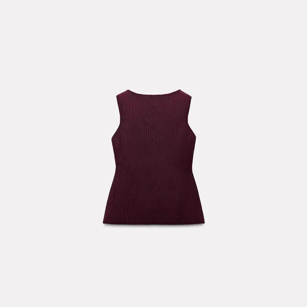 Dark red slim-fit sleeveless cardigan vest with a raised 3D pattern texture on a mannequin.