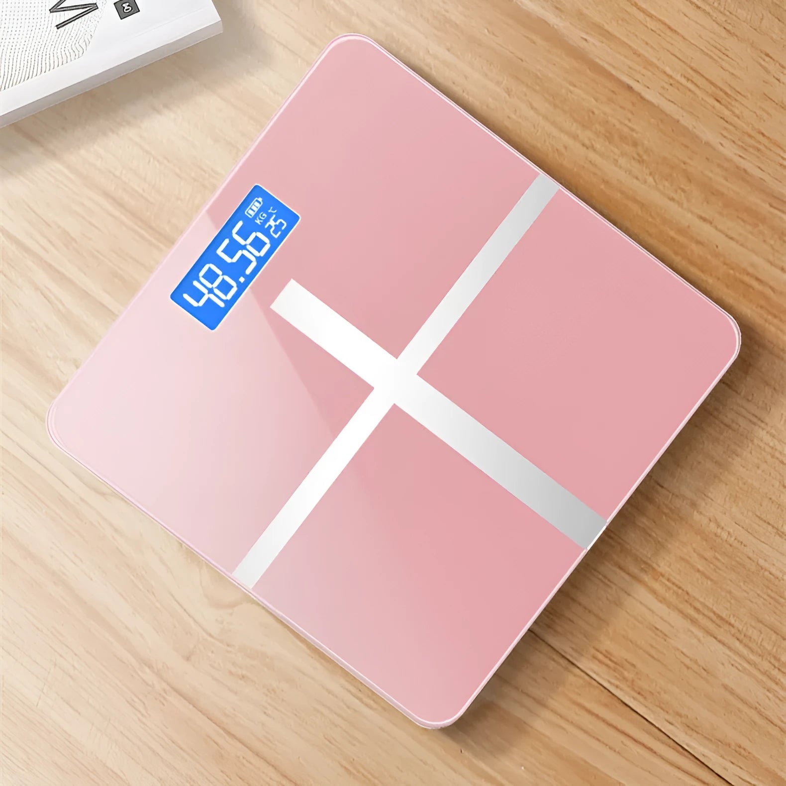 USB rechargeable electronic body scale with cross design in black, white, and rose red colour options