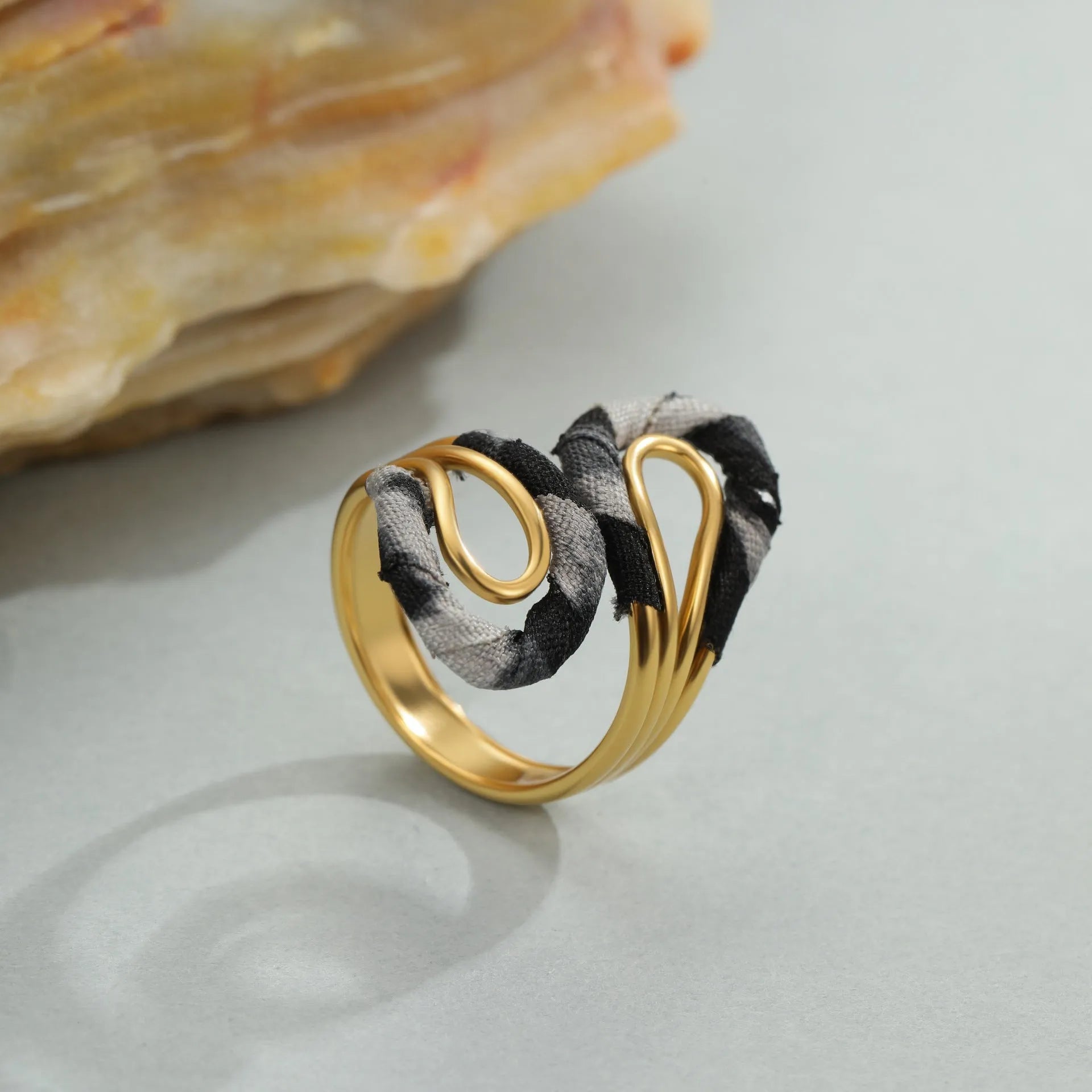 Stainless steel open mouth ring with leopard print design in geometric heart star shapes