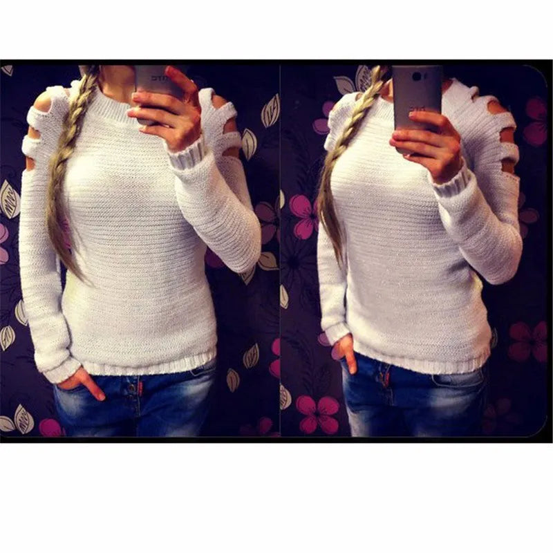 Women's grey crocheted hollow-out long sleeve knit shirt with round neckline on a mannequin