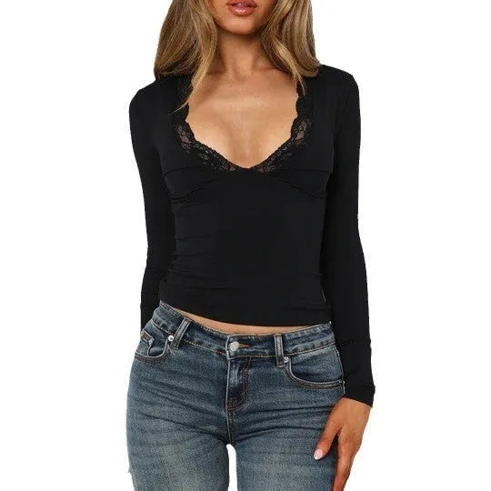Women's slim fit lace flower top in black with long sleeves and pullover design