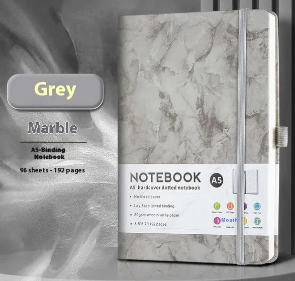 A5 diary with soft PU leather cover in a skin feeling texture, open to show horizontal line pages.