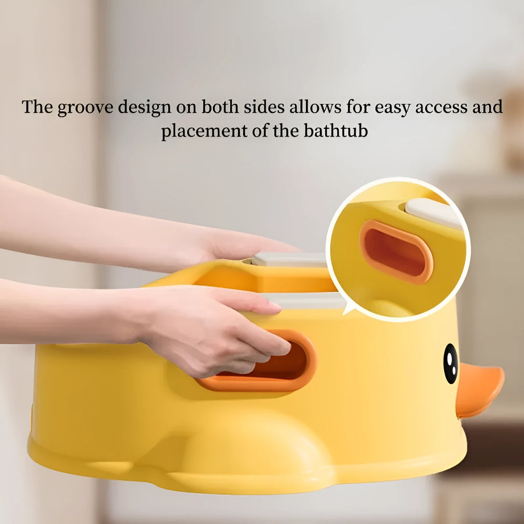 Blue duck-shaped PVC bath tub for washing dogs and cats on a patio.