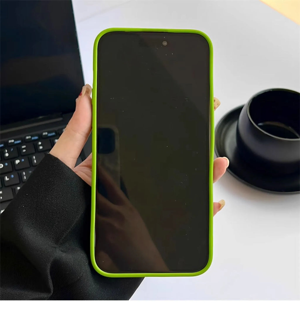 Silicone iPhone case with a simple ruffled heart design in mustard green colour.
