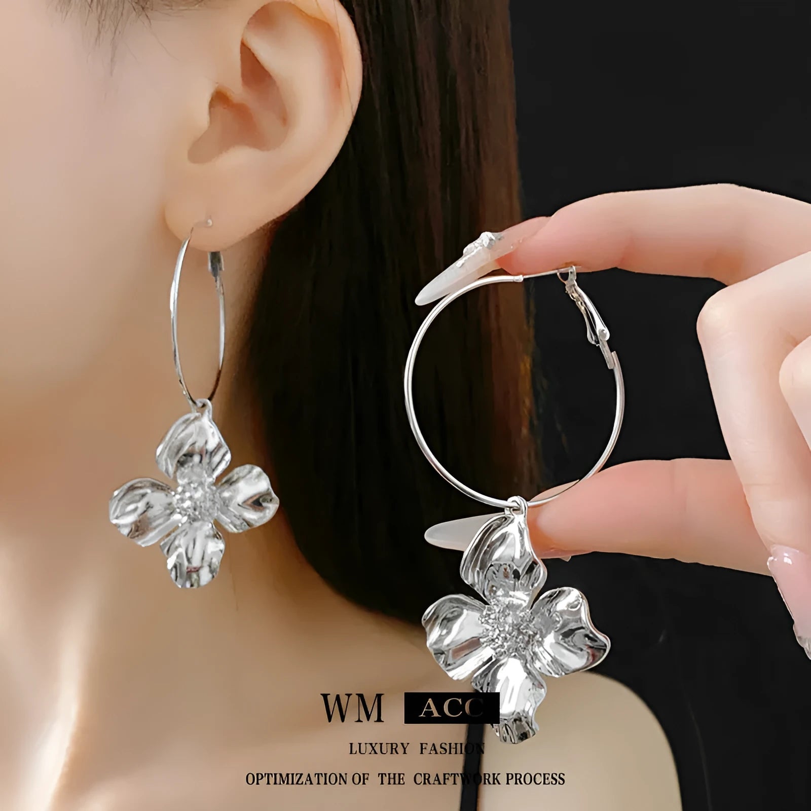 Geometric metal flower earrings with silver needle detail in gold or silver electroplated finish.