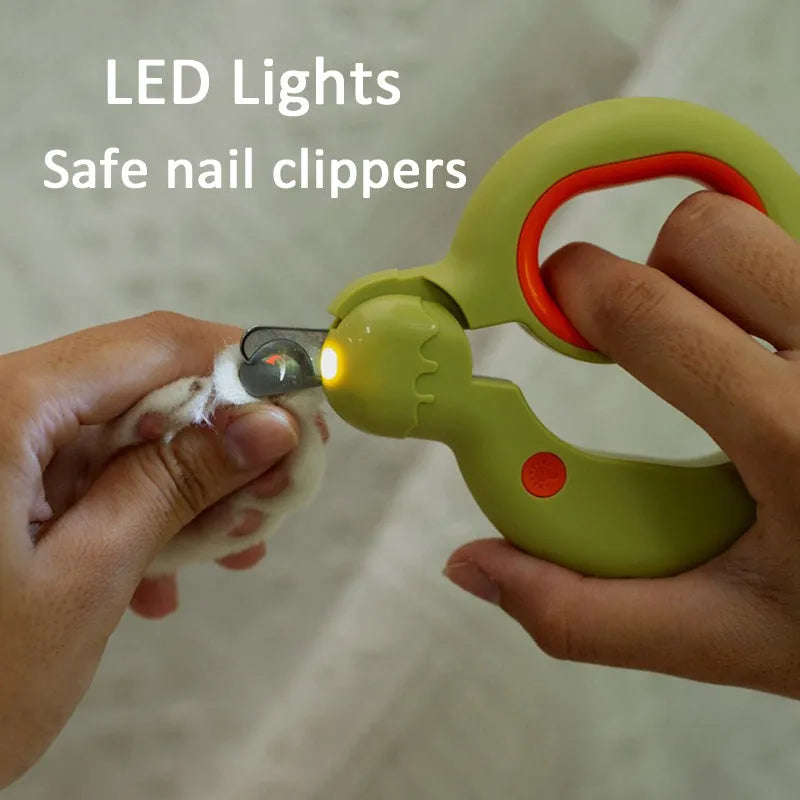 Blue pet nail clippers with LED light on, showing stainless steel blades and non-slip handles for safe dog and cat claw trimming.