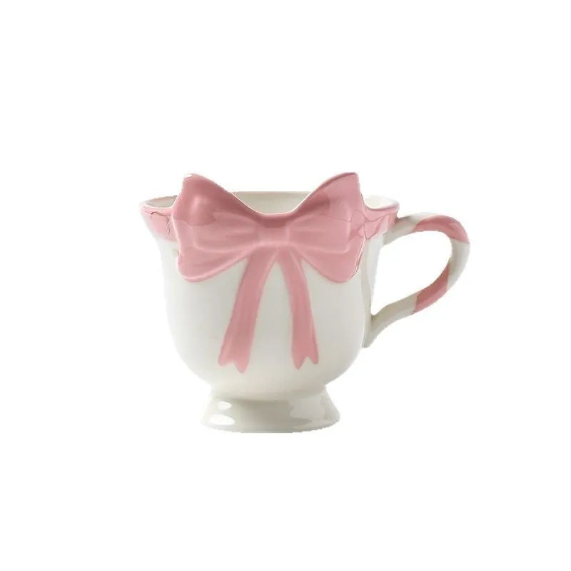 Original heart bow design ceramic mug in black pink or white powder colour, 350ml capacity.