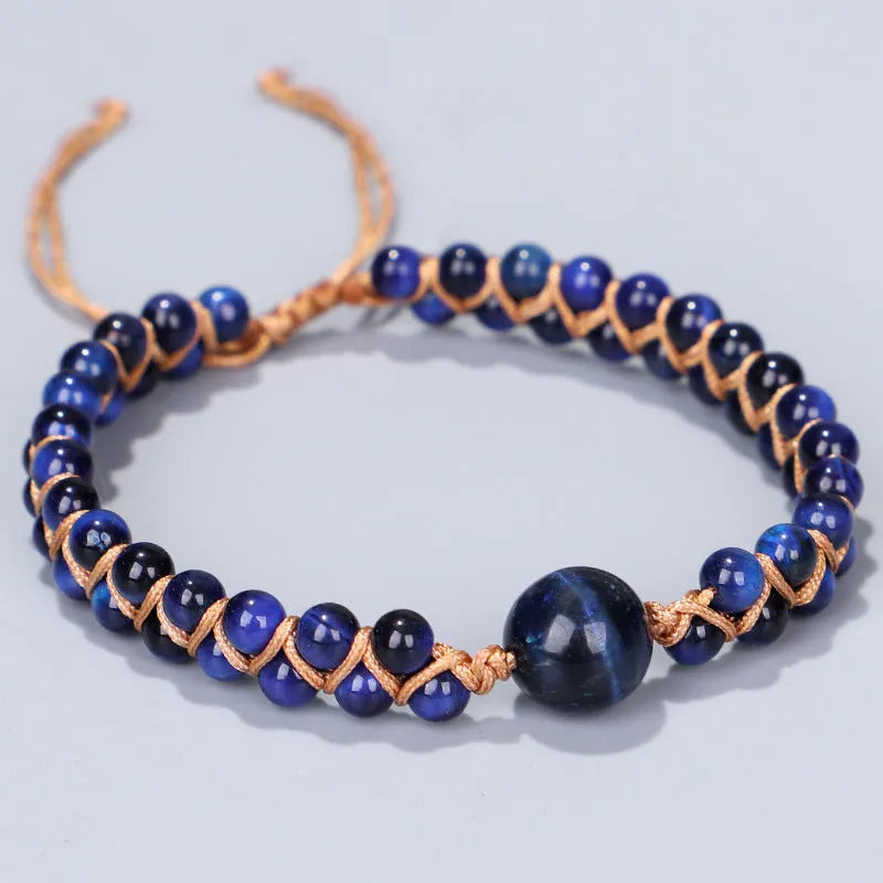 Handmade woven geometric pull bracelet with adjustable sliding knot in blue tiger eye stone