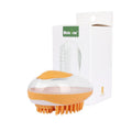 2-in-1 pet bath brush with soft silicone bristles, shampoo reservoir, and non-slip grip in pink