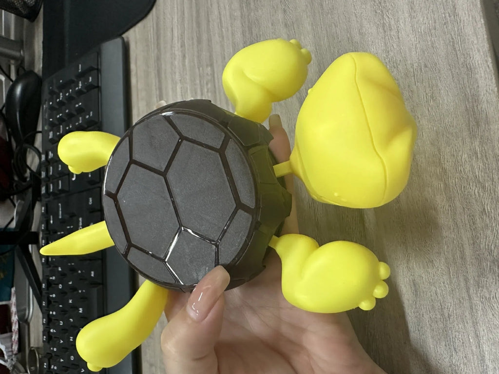 Turtle-shaped ABS plastic drink coaster in a choice of four colours: light green, dark green, wheat starch, and yellow.
