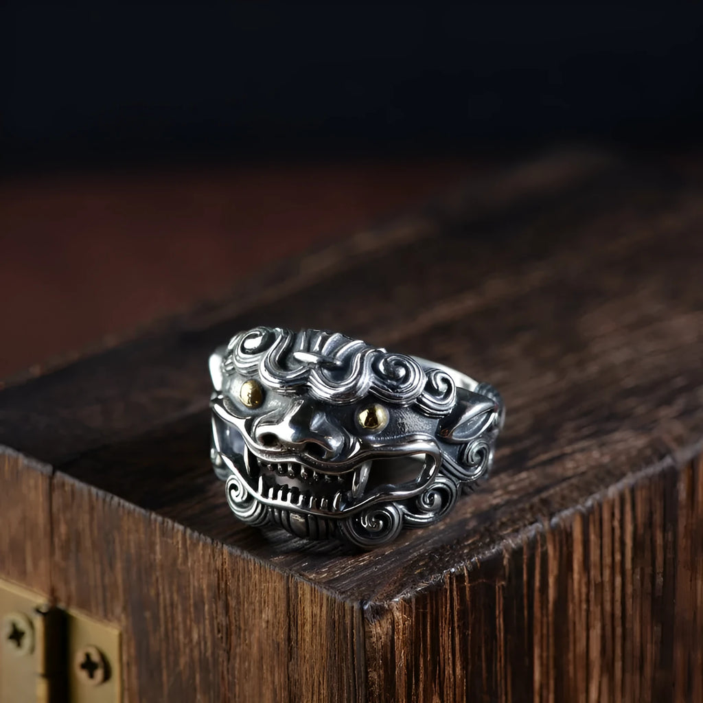 Silver open ring with jibeast pattern and diamond accents showing zodiac animal design