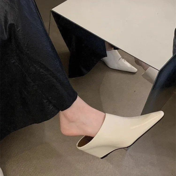 Women's closed toe slippers with wind wedge heel in black, milky white, and brown colour options